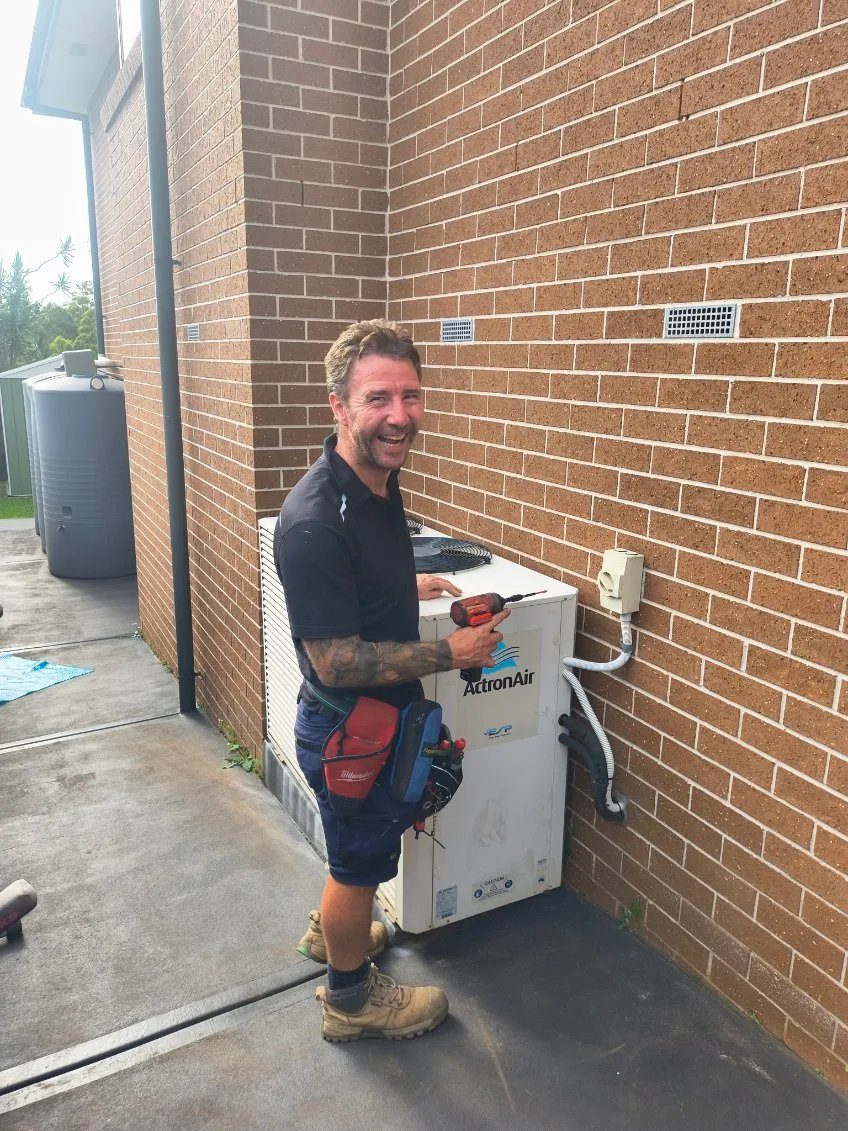 Nicky installing an ActronAir air conditioning unit